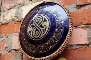 Découvrez le Guda Drum Coin Brass : Un Trésor de Sons Uniques
